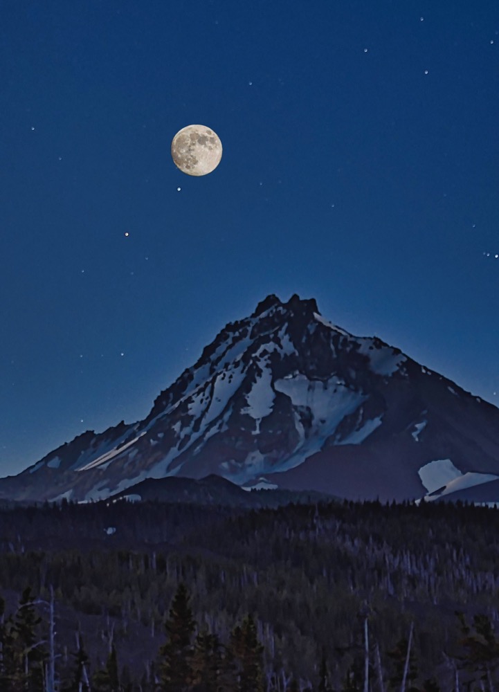 Moon over North Sister, Oregon (merged...astronomically impossible from that location!)